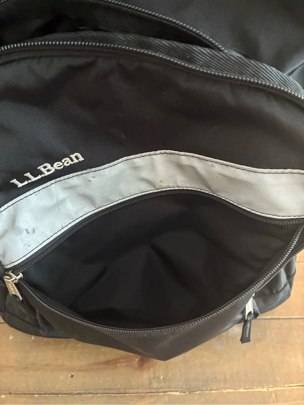 L.L. Bean Black Rolling Backpack with Silver Reflective Accent